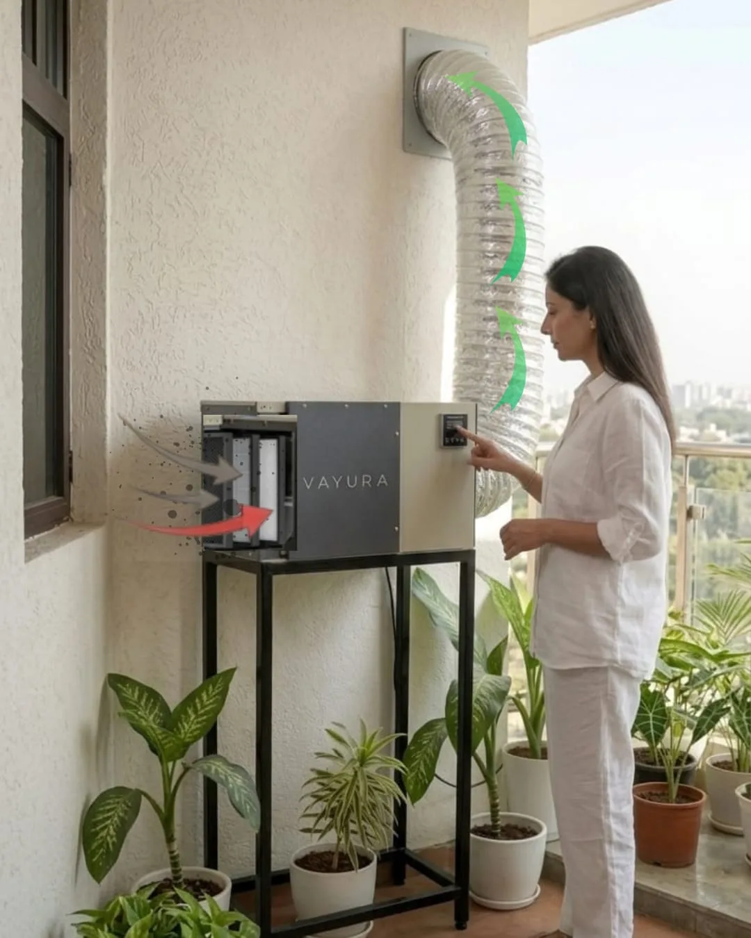 Vayura unit installed on a balcony, with the outdoor-air duct entering and filtered air pressurising into the home
